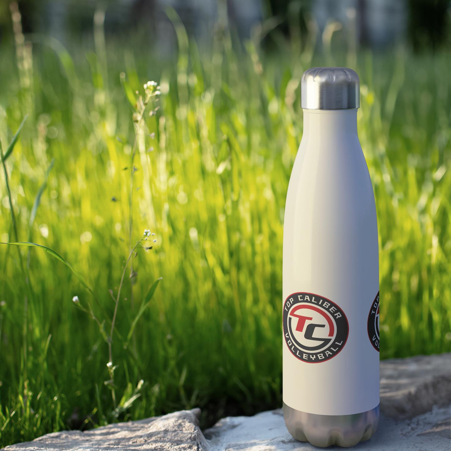 TCVC_20z_Insulated_Water_Bottle_WaterBottle_Outdoor_grass_Mockup.png_15288959